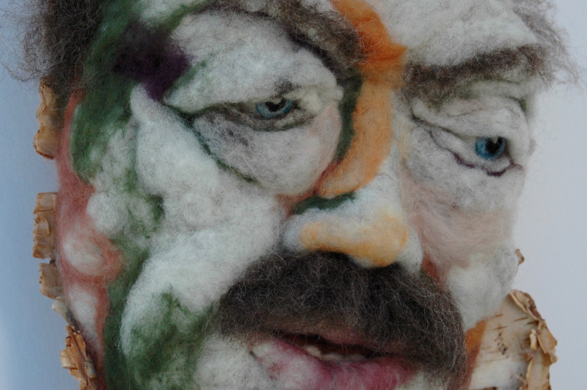 Télesphore_detail - Hand needle-felted wool sculpture of a male face, balding with bushy brown moustache. Mounted on reclaimed birch bark. Artist/photo: Rosemarie Péloquin.