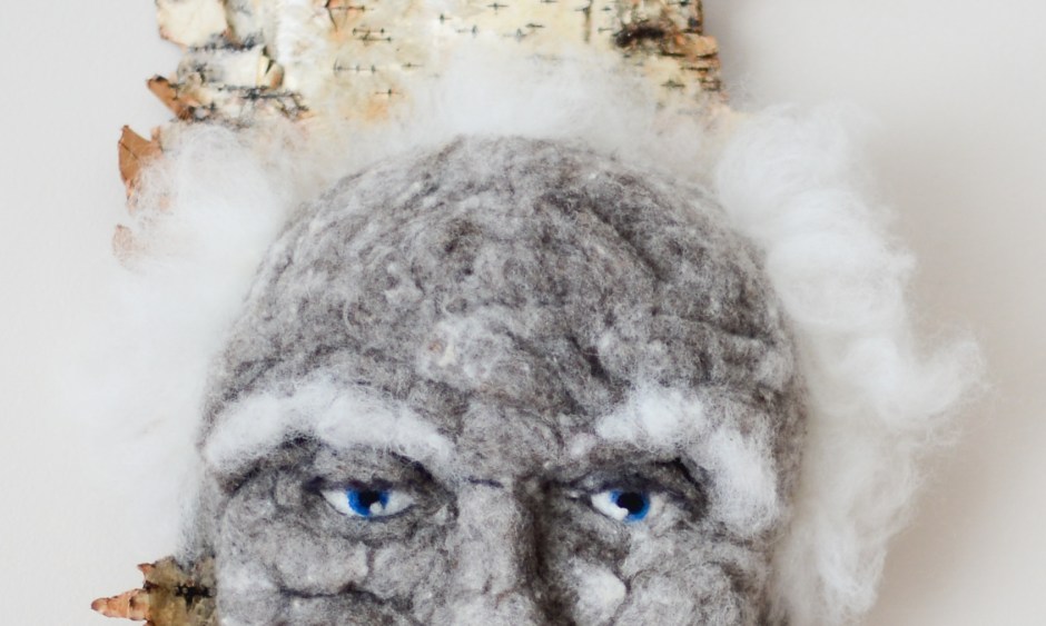 Oscar. Hand needle-felted wool sculpture on birch bark. Blue eyed male with floppy white hair. artist: Rosemarie Péloquin; photo: Emily Christie.